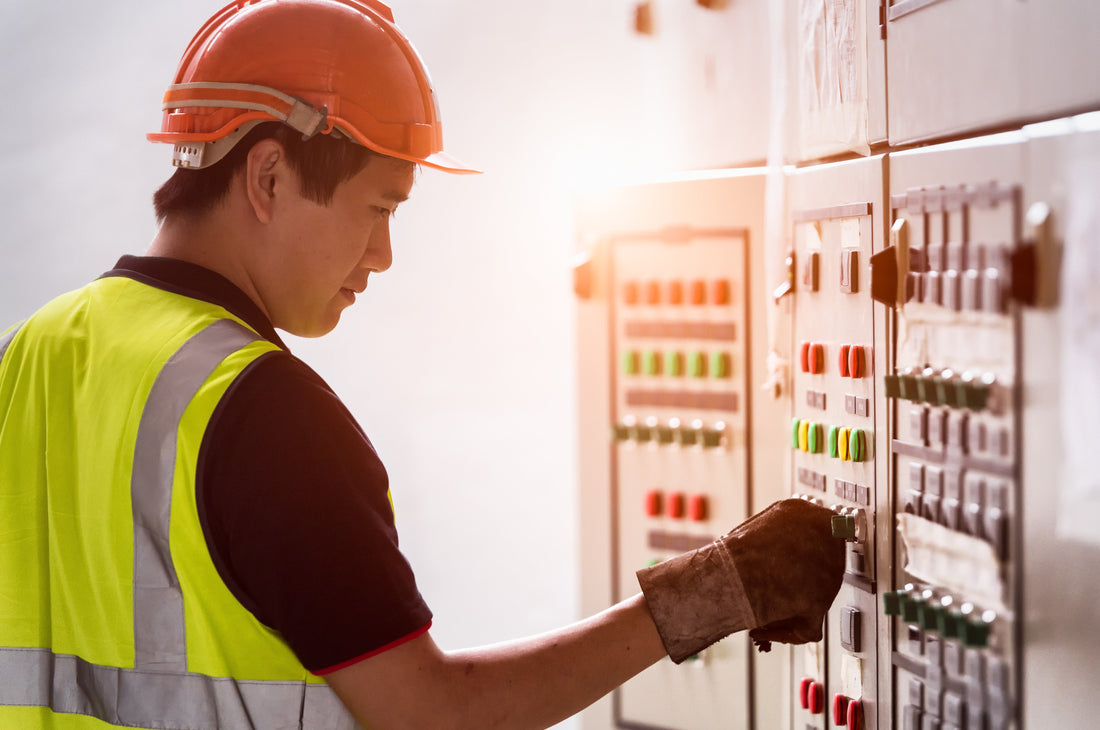 Electrical contractor testing a panel