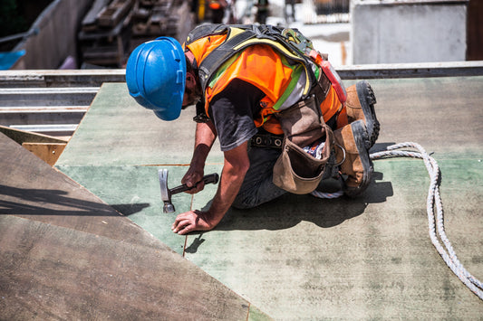 contractor working on roofing construction